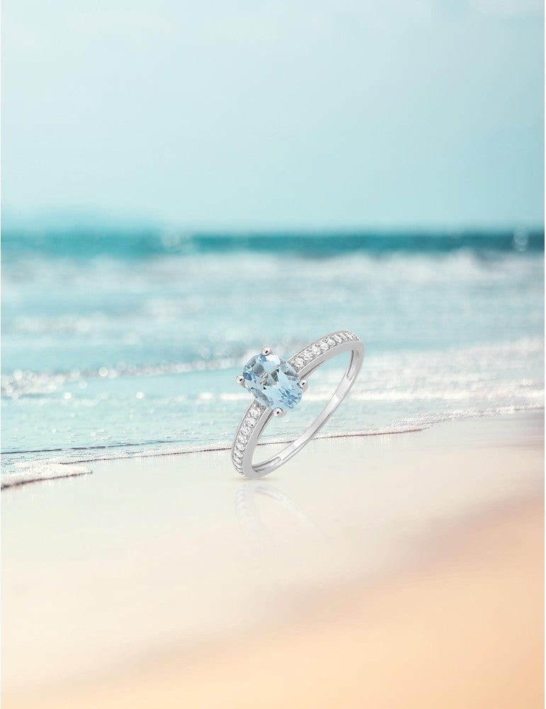 Bague en or blanc 9ct, topaze et zirconiums 402-49