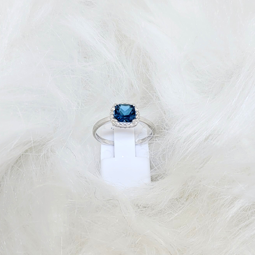 Bague en or blanc 18 ct et topaze london 307-101